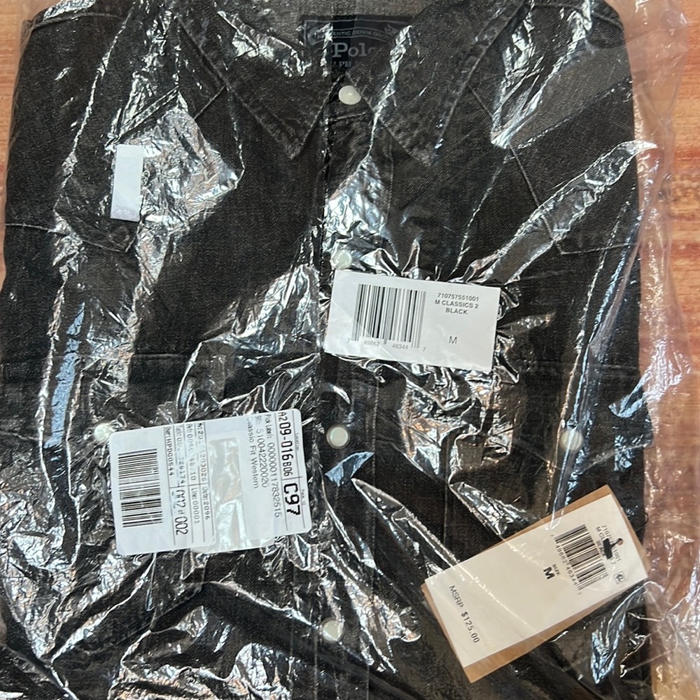 Ralph Lauren. Mens black denim western fit button shirt. Has pearlized buttons.